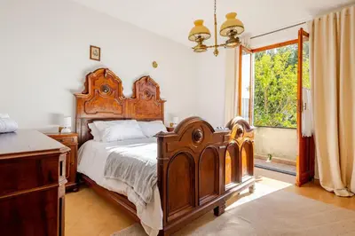Letto o letti in una camera di Casa Marian