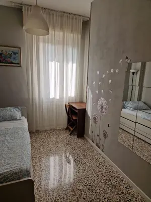 Letto o letti in una camera di Marigold House