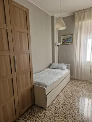 Letto o letti in una camera di Marigold House