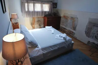Letto o letti in una camera di Guest House Dell'Affresco