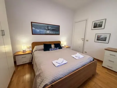 Letto o letti in una camera di Il Gabbiano Bianco by Holiday World
