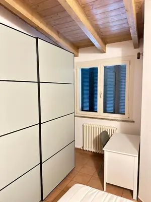 Letto o letti in una camera di Dimora Farnese