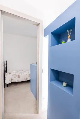 Letto o letti in una camera di appartamento San Michele