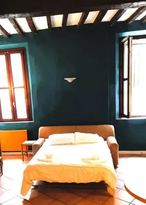 Letto o letti in una camera di Va Pensiero Cuore di Parma
