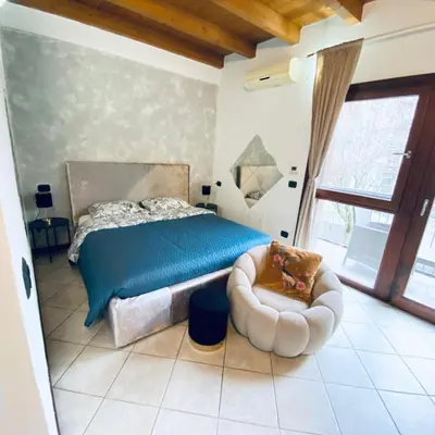 Letto o letti in una camera di Liberamente - Gino -garage incluso