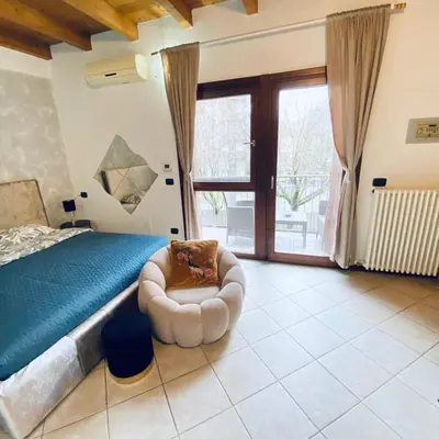 Letto o letti in una camera di Liberamente - Gino -garage incluso