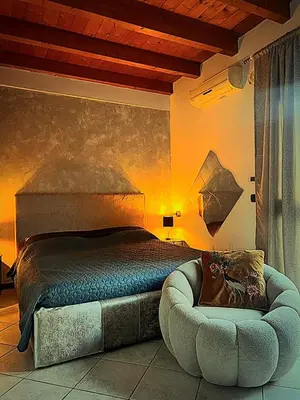 Letto o letti in una camera di Liberamente - Gino -garage incluso