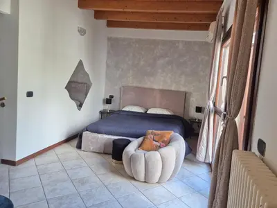 Letto o letti in una camera di Liberamente - Gino -garage incluso