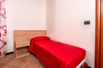 Letto o letti in una camera di 334 - Residence Montebello Bilocale B, Relax nel verde con Piscina