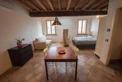 Letto o letti in una camera di B&B Le Grazie