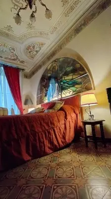 Letto o letti in una camera di DIMORA della TORRE a due passi dal mare