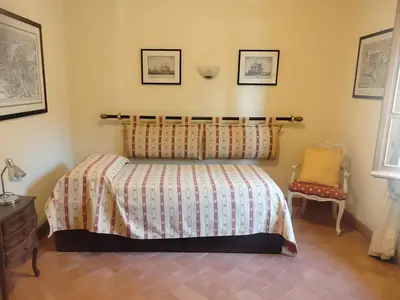 Letto o letti in una camera di L'Alcova tra gli ulivi