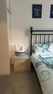 Letto o letti in una camera di Casa Conchiglia 6 ospiti 10 min mare e centro