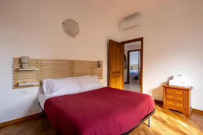 Letto o letti in una camera di Appartamento Roberta-5 beds,AC