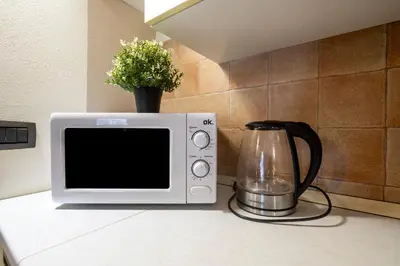 Cucina o angolo cottura di 336 - Residence Montebello Monolocale D, Relax nel verde con Piscina