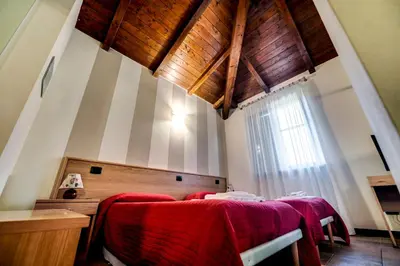 Letto o letti in una camera di 336 - Residence Montebello Monolocale D, Relax nel verde con Piscina