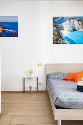 Letto o letti in una camera di Orizzonte 5 Terre - Via Lunigiana 221 - Stazione Migliarina, interno 18