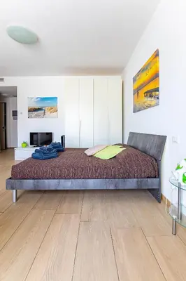 Letto o letti in una camera di Orizzonte 5 Terre - Via Lunigiana 221 - Stazione Migliarina, Interno 19