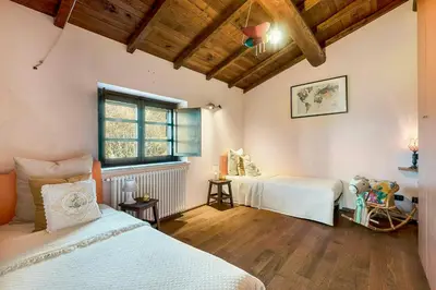 Letto o letti in una camera di Panoramic Villa With Pool In Lunigiana