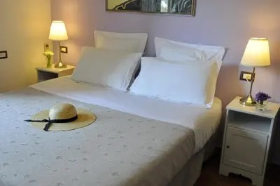 Letto o letti in una camera di Cà du Ferrà - Farm and Relax