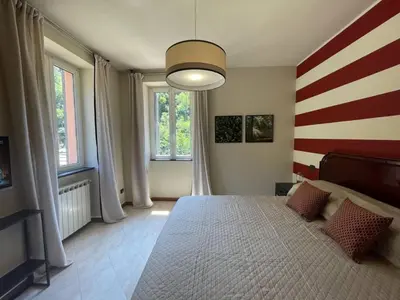 Letto o letti in una camera di Apartment 'Il Bosco' mit Terrasse by Interhome