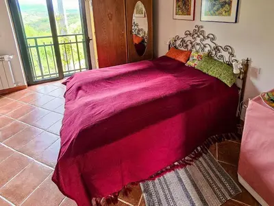 Letto o letti in una camera di Apartment Mini-Appartement Casa Colombana mit Panoramablick by Interhome