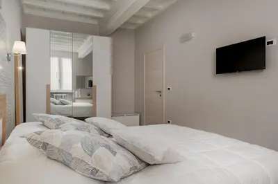 Letto o letti in una camera di Bici gratis e Wi-Fi a 5 Min dal Ducale