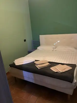 Letto o letti in una camera di Rifugio Della Pietra