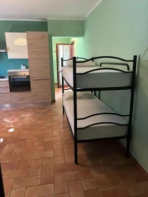 Letto o letti in una camera di Rifugio Della Pietra