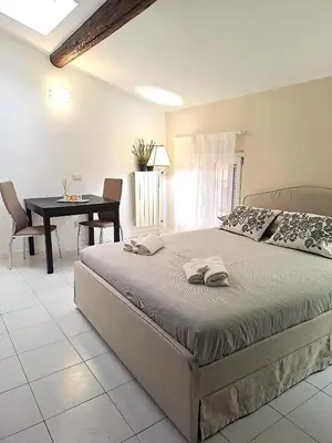 Letto o letti in una camera di Residence Borghesi