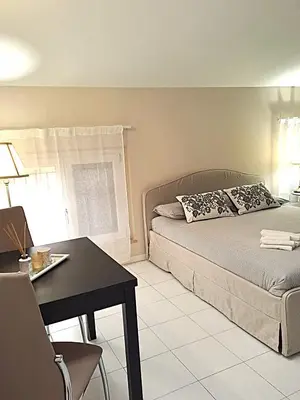 Letto o letti in una camera di Residence Borghesi