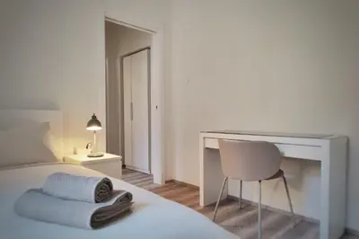 Letto o letti in una camera di Otto Violini - City Center