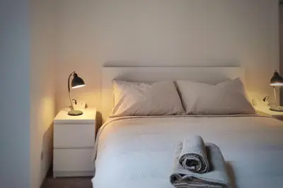 Letto o letti in una camera di Otto Violini - City Center