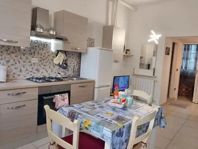 Cucina o angolo cottura di A Casa di Fede&Ele all'interno delle mura romane