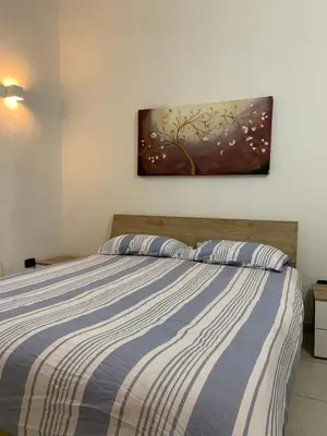 Letto o letti in una camera di A Casa di Fede&Ele all'interno delle mura romane