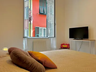 Letto o letti in una camera di Remolari, Two-room apartment in the historic center