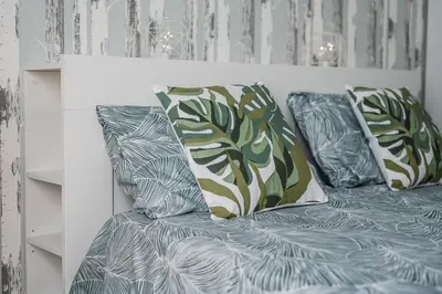 Letto o letti in una camera di La Casa di Parma - Strategic Location