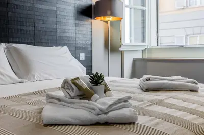 Letto o letti in una camera di Salina Luxury Suites