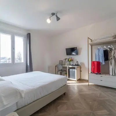 Letto o letti in una camera di Hotel Donatello
