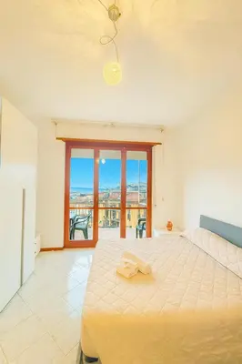 Letto o letti in una camera di WELCOME RIVIERA-SCORCIO BLU-parking