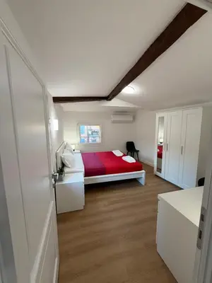 Letto o letti in una camera di Residence Adriano