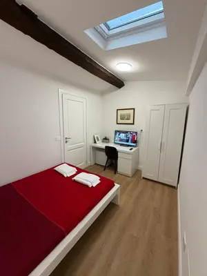 Letto o letti in una camera di Residence Adriano