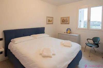 Letto o letti in una camera di Da Roberto