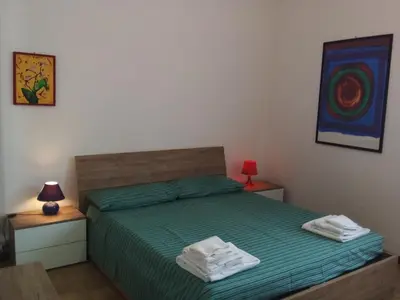 Letto o letti in una camera di La casa di Ele&Giò, Lodi Viale Rimembranze