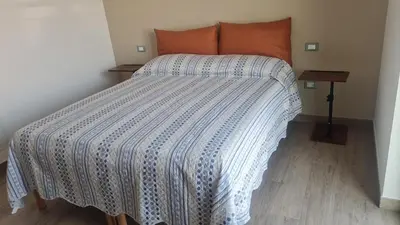 Letto o letti in una camera di Civitas Locanda