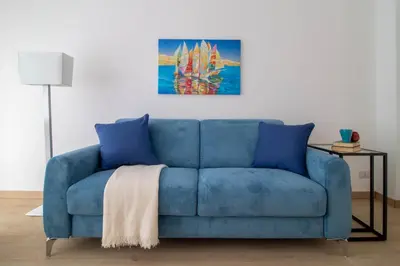Area soggiorno di Sirius Apartment - Affitti Brevi Italia