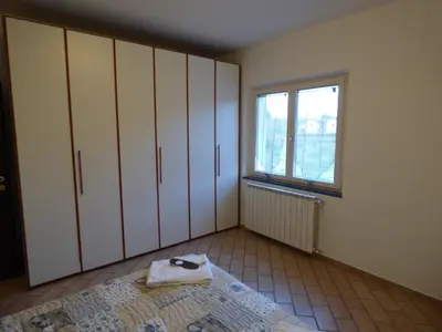 Letto o letti in una camera di B&B Podere Montese