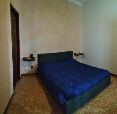 Letto o letti in una camera di AL GRATTACIELO appartamento panoramico
