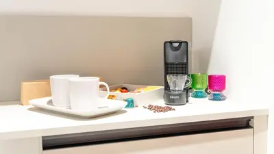 Set per la preparazione di tè e caffè presso DOMUS 1435 - Iconic Suites in Centro
