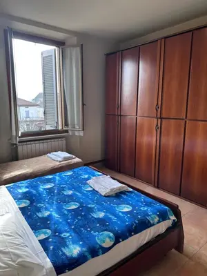 Letto o letti in una camera di Soldi 17 Cremona Stadio